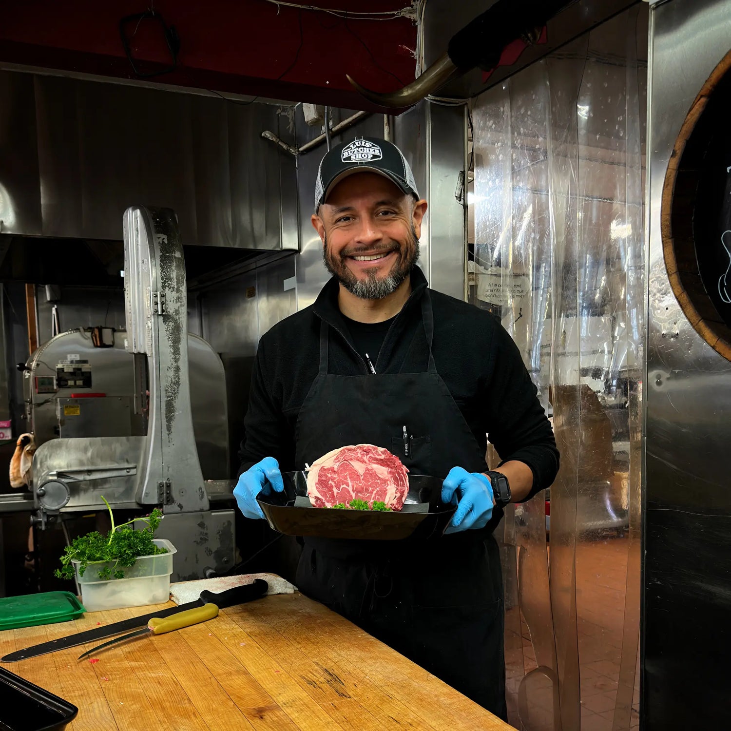 An image of Moises, owner and butcher of Luis' Butcher Shop