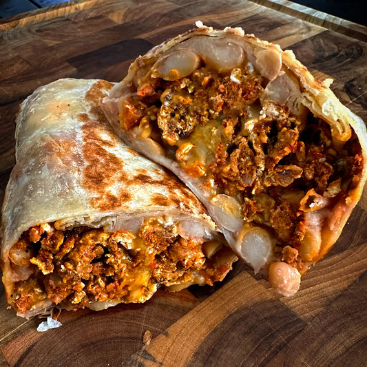 Breakfast Burrito with eggs, potato, cheddar cheese, and choice of meat.