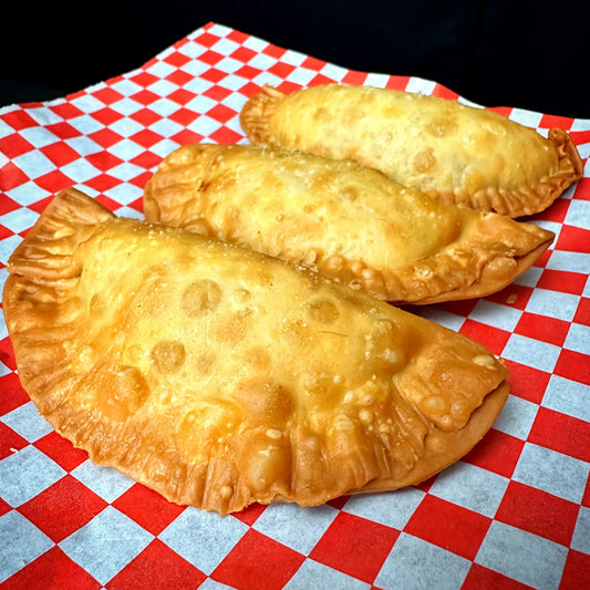 Fried empanada stuffed with hickory-smoked brisket and potato. Crispy, smoky, and satisfying — now available at Luis' Butcher Shop.