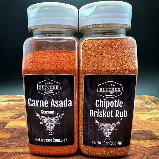 A set of Luis' Butcher Shop Seasoning Combo #1, including Carne Asada rub for grilling and Chipotle Brisket rub for smoking.