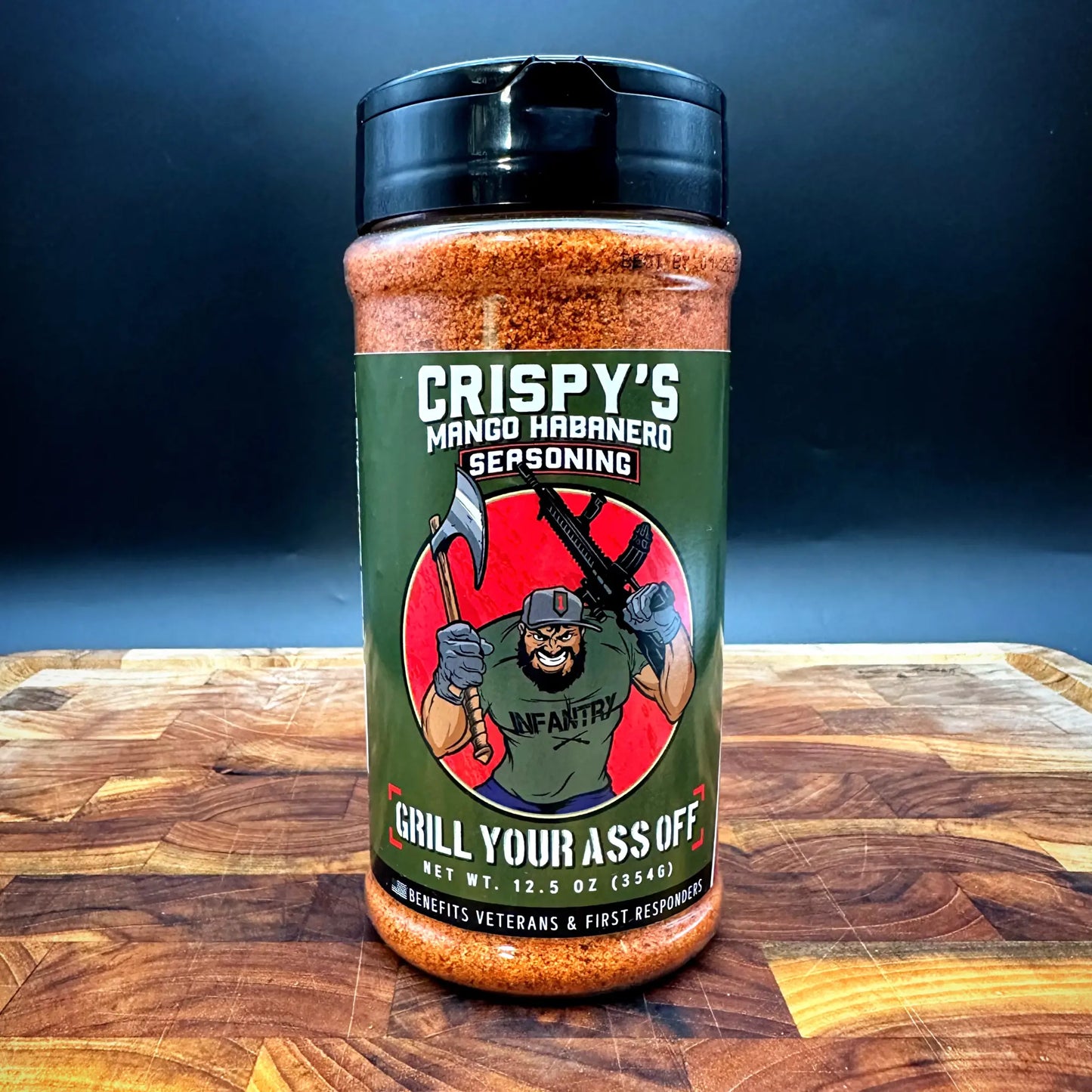 A jar of GYAO Mango Habanero seasoning, perfect for grilling or smoking pork and chicken.