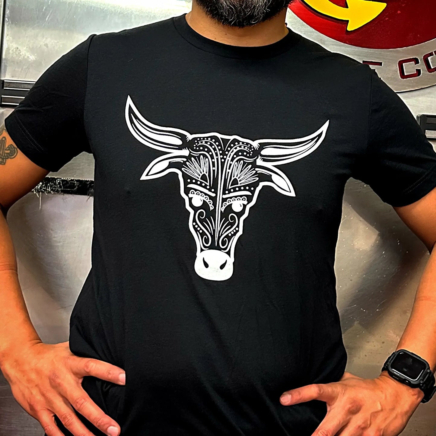 Luis' Butcher Shop Men's T-Shirt with Cow Graphic on Front.