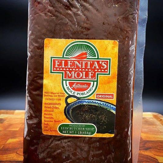 In house made Mole Poblano made with imported Mexican chiles by Luis' Butcher Shop.