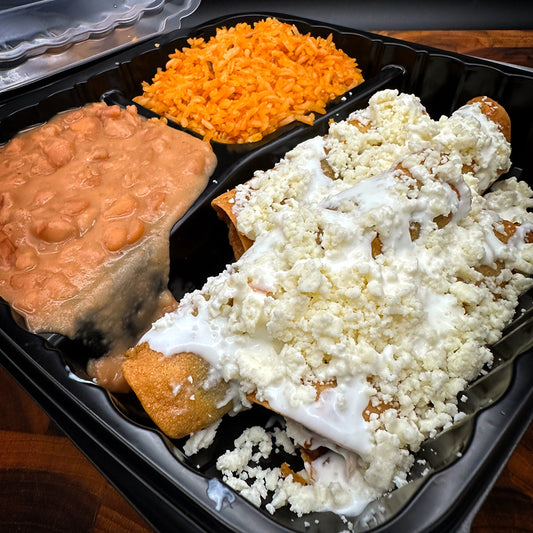 Taquito plate with 4 crispy beef tallow fried taquitos served with rice and beans
