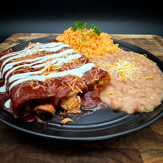 Enchiladas with cheese or shredded chicken, enchilada sauce, rice, and beans.
