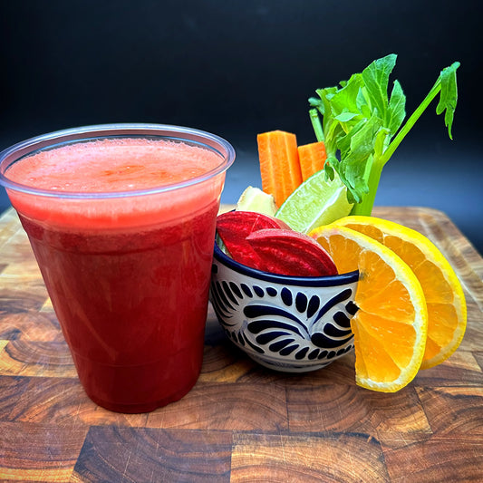 Natural Juice 16oz with orange, beet, carrot, ginger, celery, and lime.